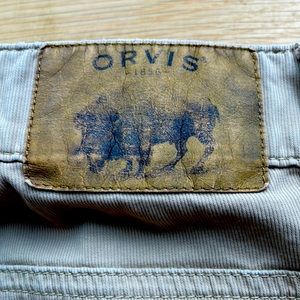 Orvis five pocket pants, 97% cotton, 3% spandex/elastane. No stains
